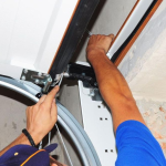 Allied Door fixing the cable
